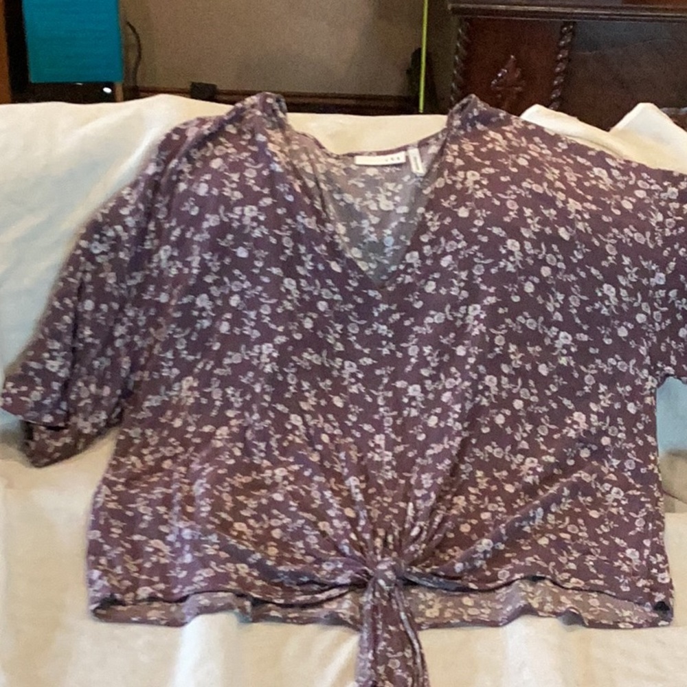 Purple and white flowered blouse